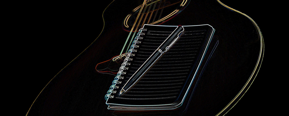 guitar with writing pad and pen